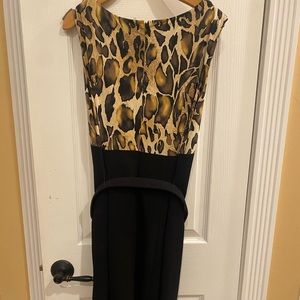 Cache Sophisticated dress from office to night out.